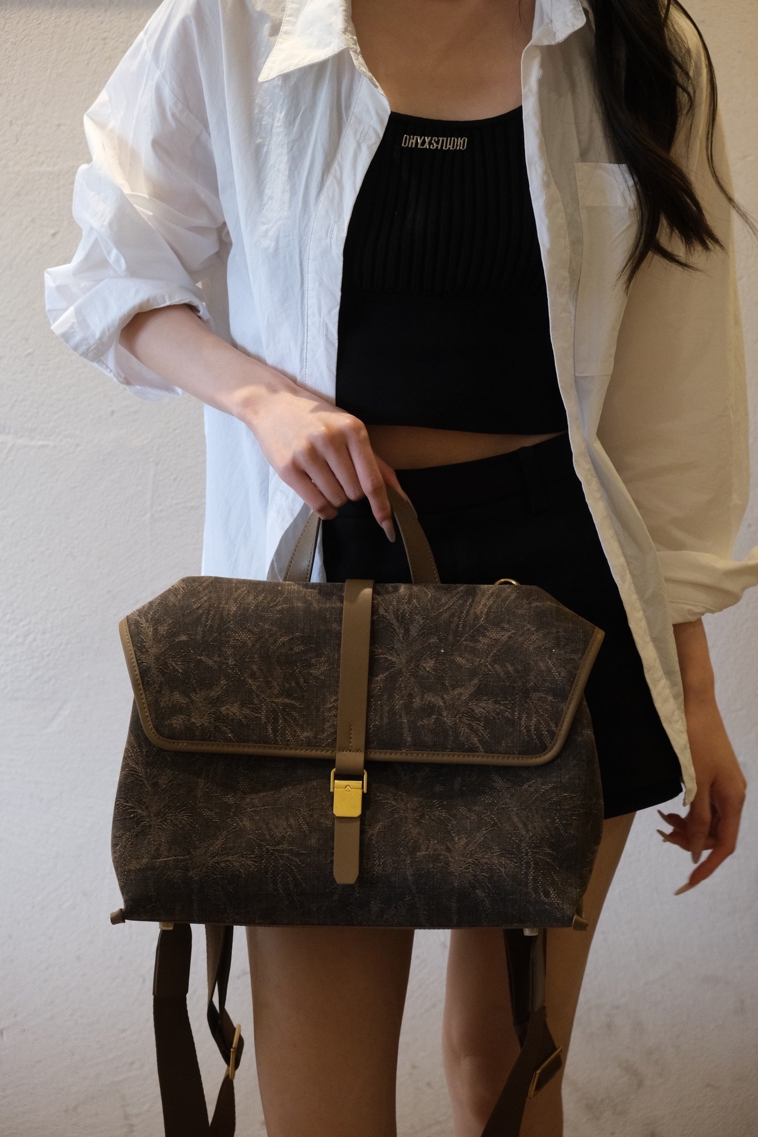 Artisan collection of handmade Xiangyunsha silk leather handbags
