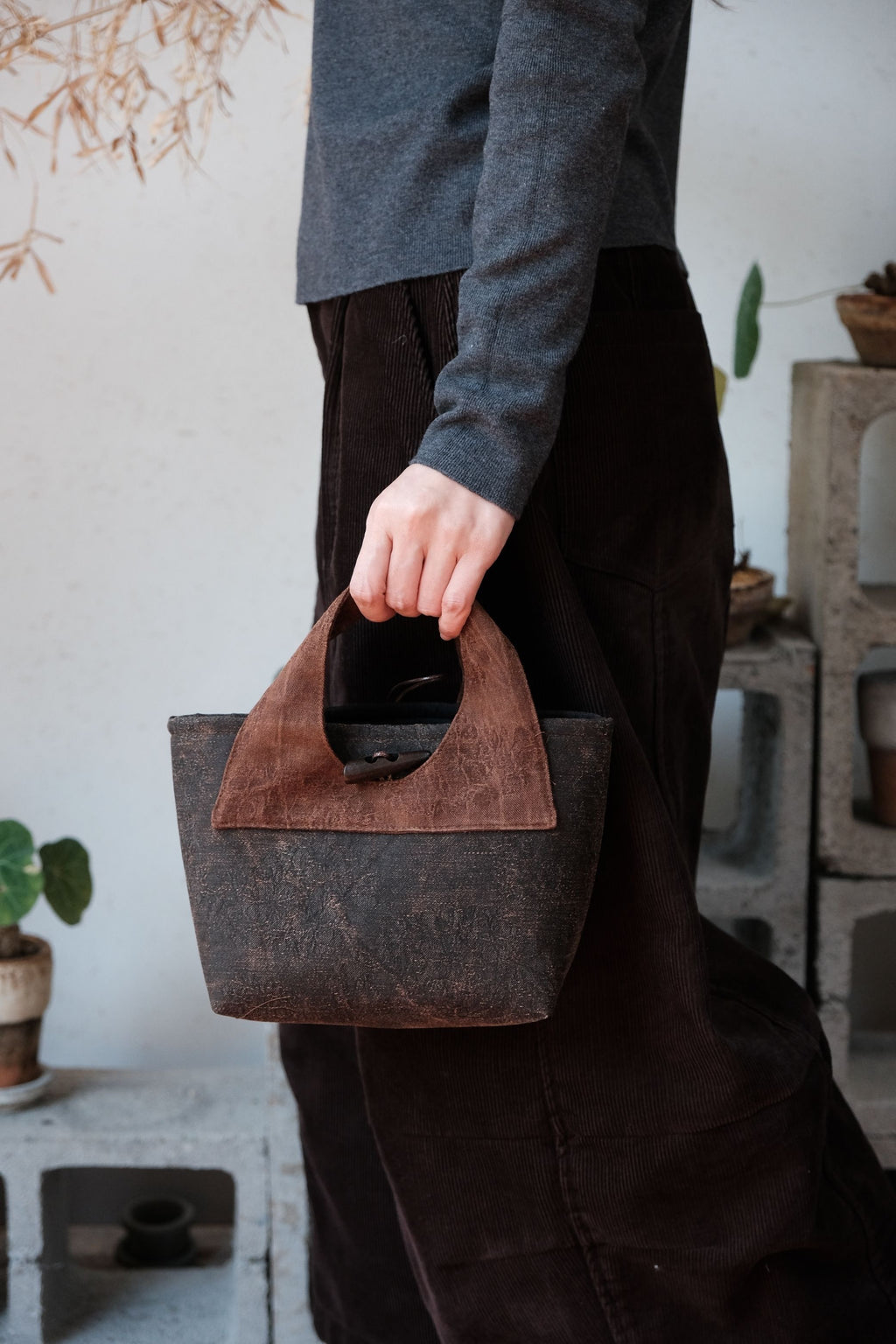 Luxury handmade silk purse crafted with traditional techniques