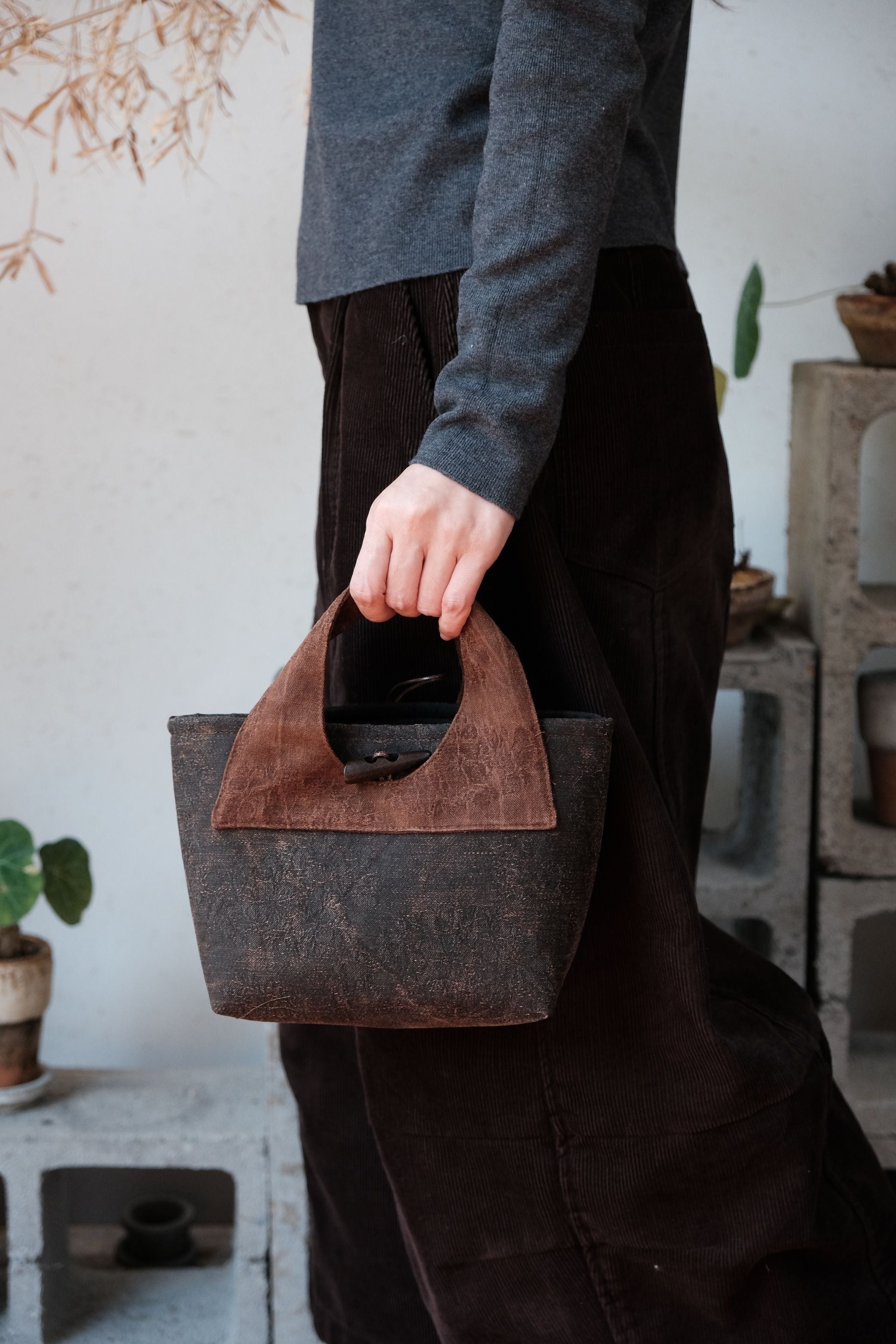 Luxury handmade silk purse crafted with traditional techniques