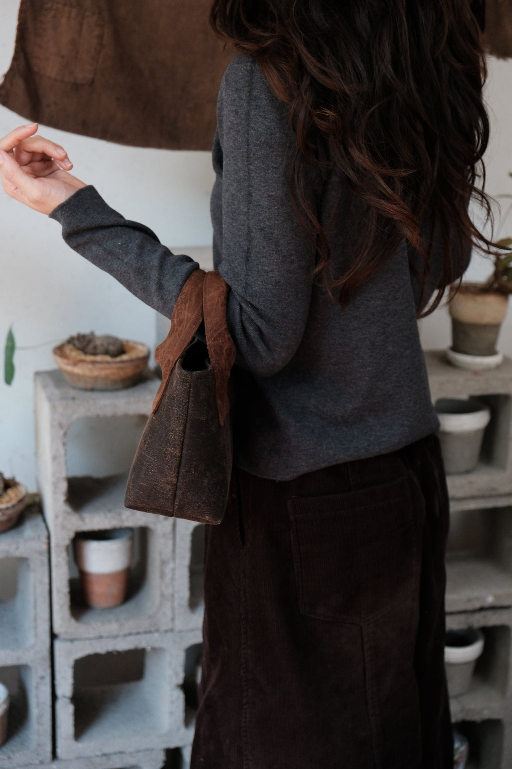Handcrafted leather silk purse with premium artisan details