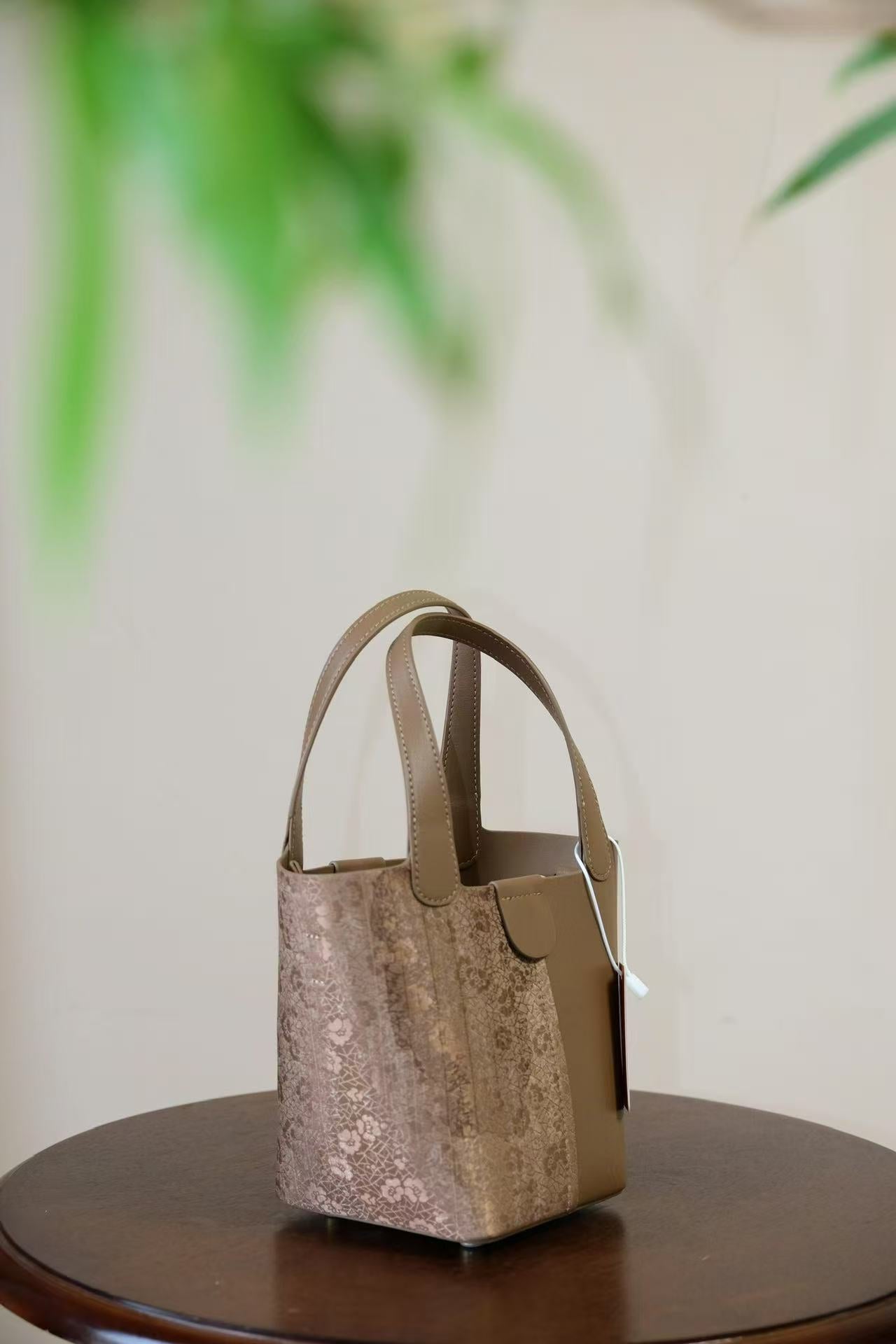 Artisan crafted Lingjin silk handbag collection