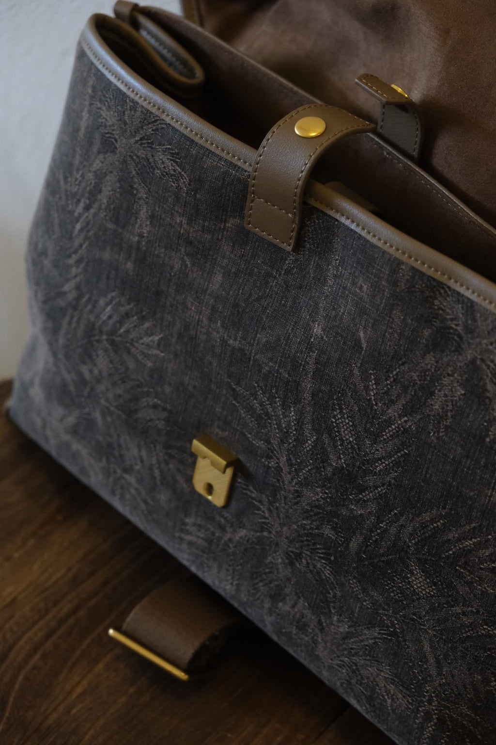 Luxury handmade womens handbag featuring Xiangyunsha silk and genuine leather