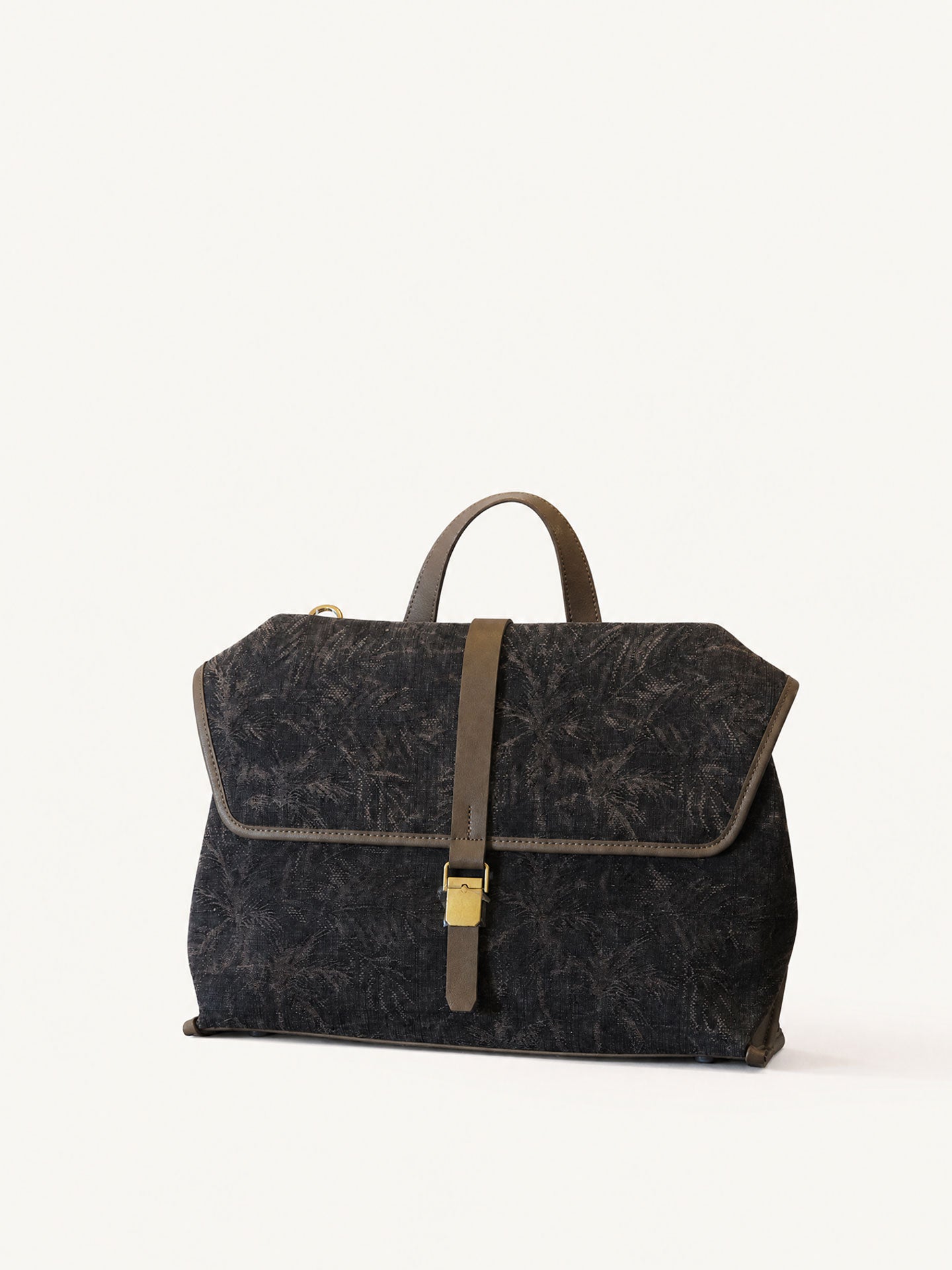 Luxury genuine leather edge details of handcrafted silk handbag