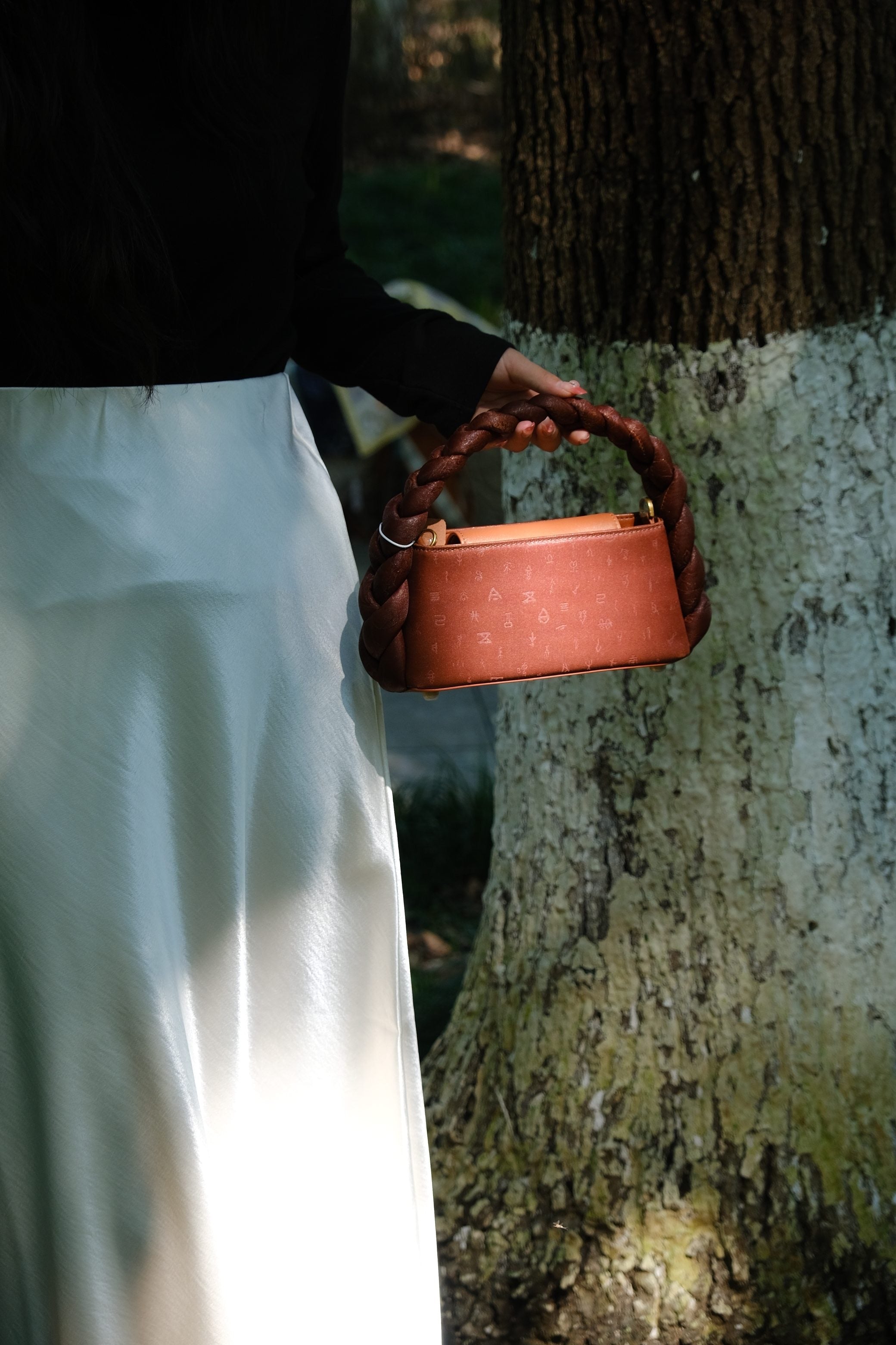 Luxury Xiangyunsha fashion bag with genuine leather craftsmanship