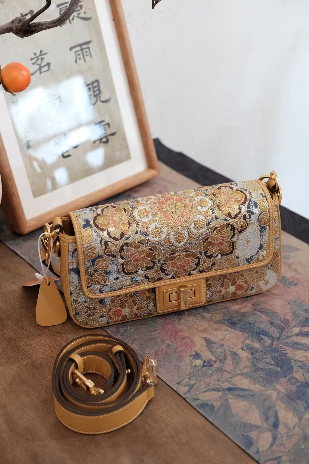Elegant Nishijin-ori handbag featuring traditional woven silk