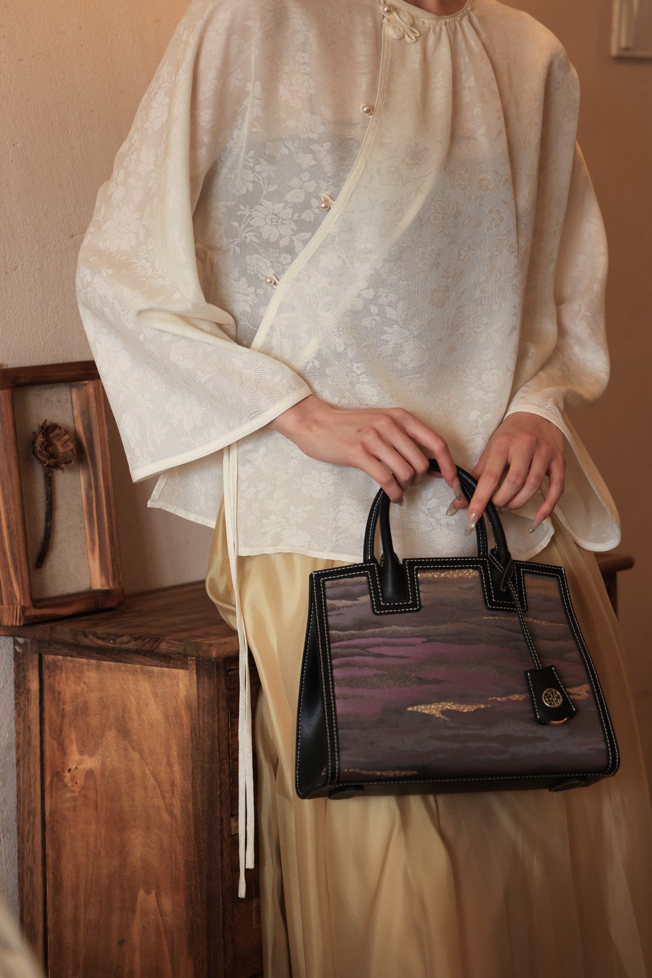 Traditional Nishijin weaving craftsmanship showcased in silk handbags