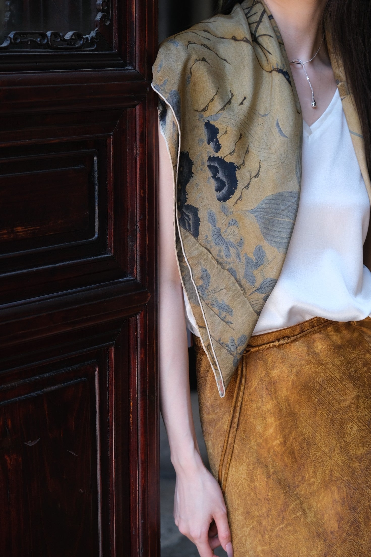Artistic silk scarf featuring traditional beauty