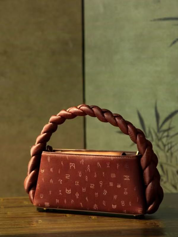 Collection of silk leather handbags with traditional Chinese influence