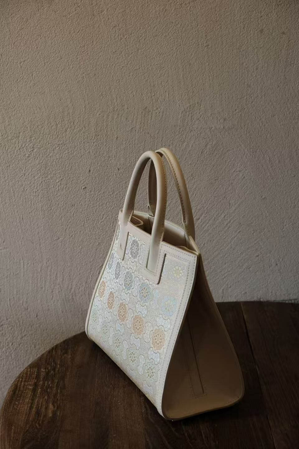 Chinese heritage inspired Songjin silk handbag design