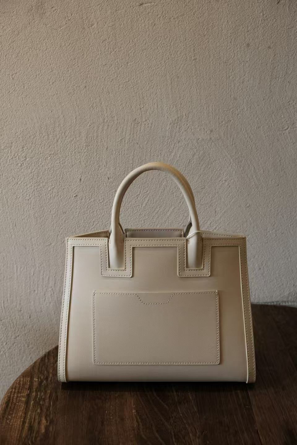 Designer style Songjin silk handbag inspired by tradition