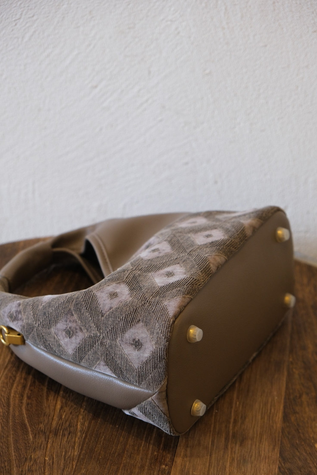Traditional silk art transformed into modern fashion handbag