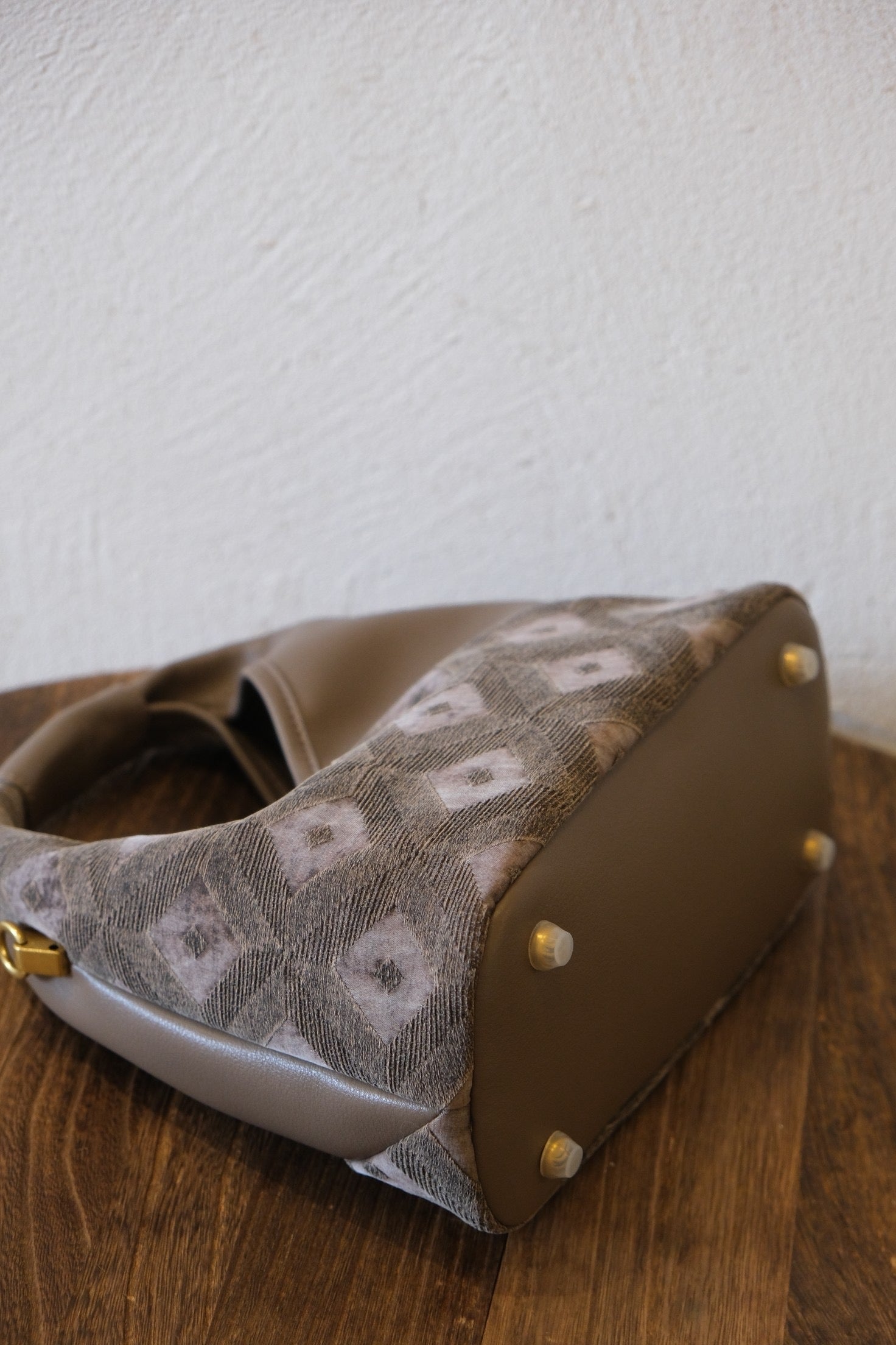 Traditional silk art transformed into modern fashion handbag