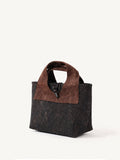 Traditional silk leather purse featuring Chinese heritage craftsmanship