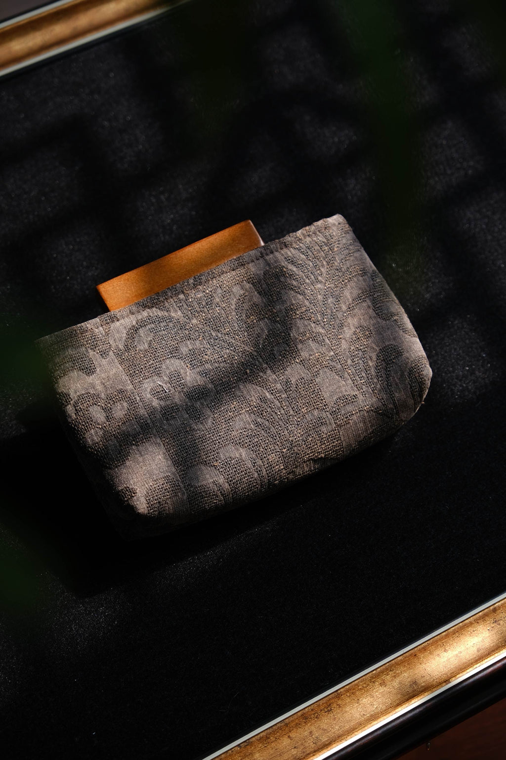 Artistic Xiangyunsha silk handbag with cultural inspiration