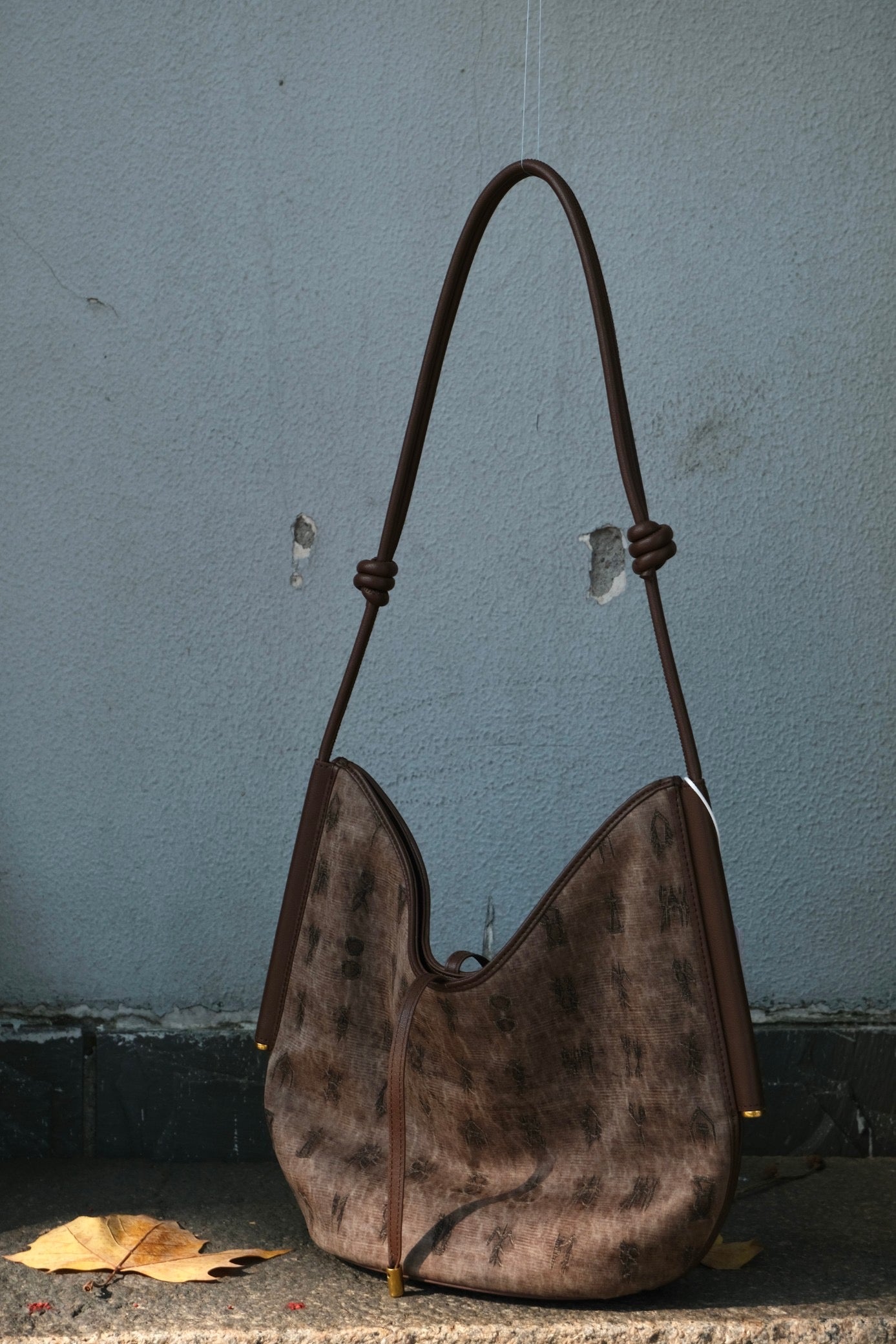 Elegant Xiangyunsha silk clutch bag inspired by Chinese heritage