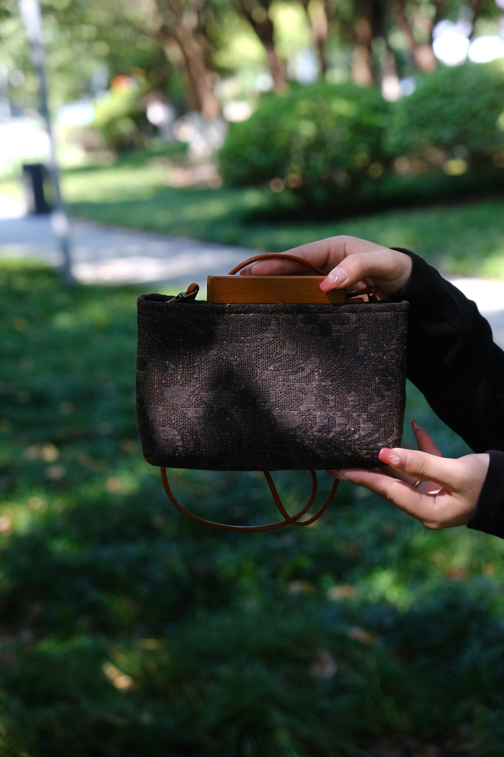 Handcrafted Xiangyunsha silk purse with leather details