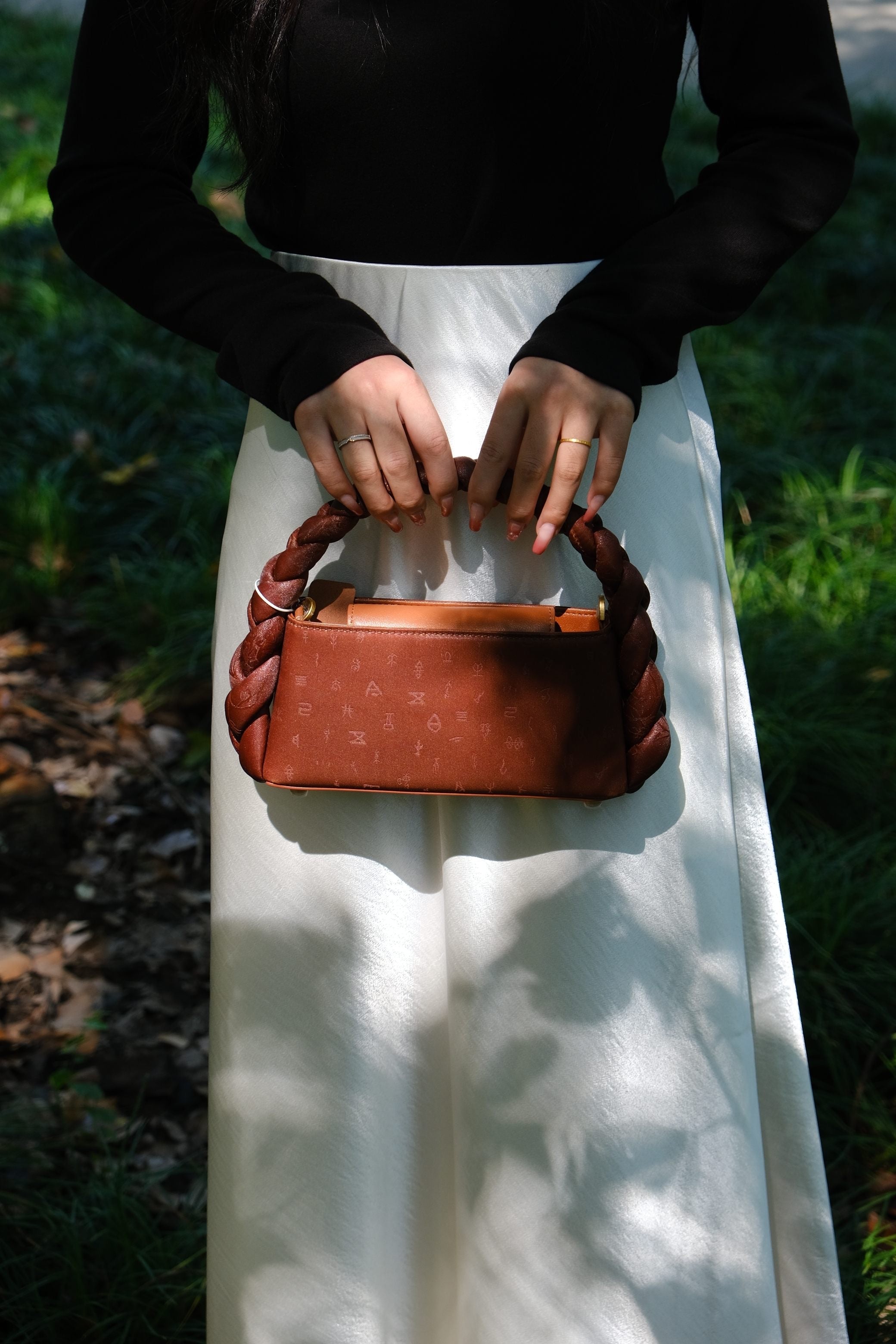 Xiangyunsha silk leather handbag with premium artisan design