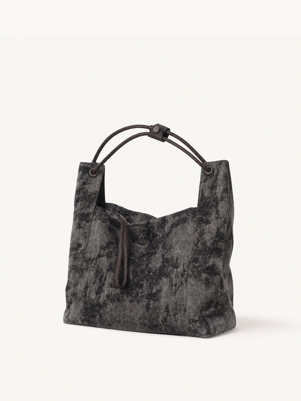 Handcrafted Xiangyunsha silk leather handbag inspired by Chinese heritage craftsmanship